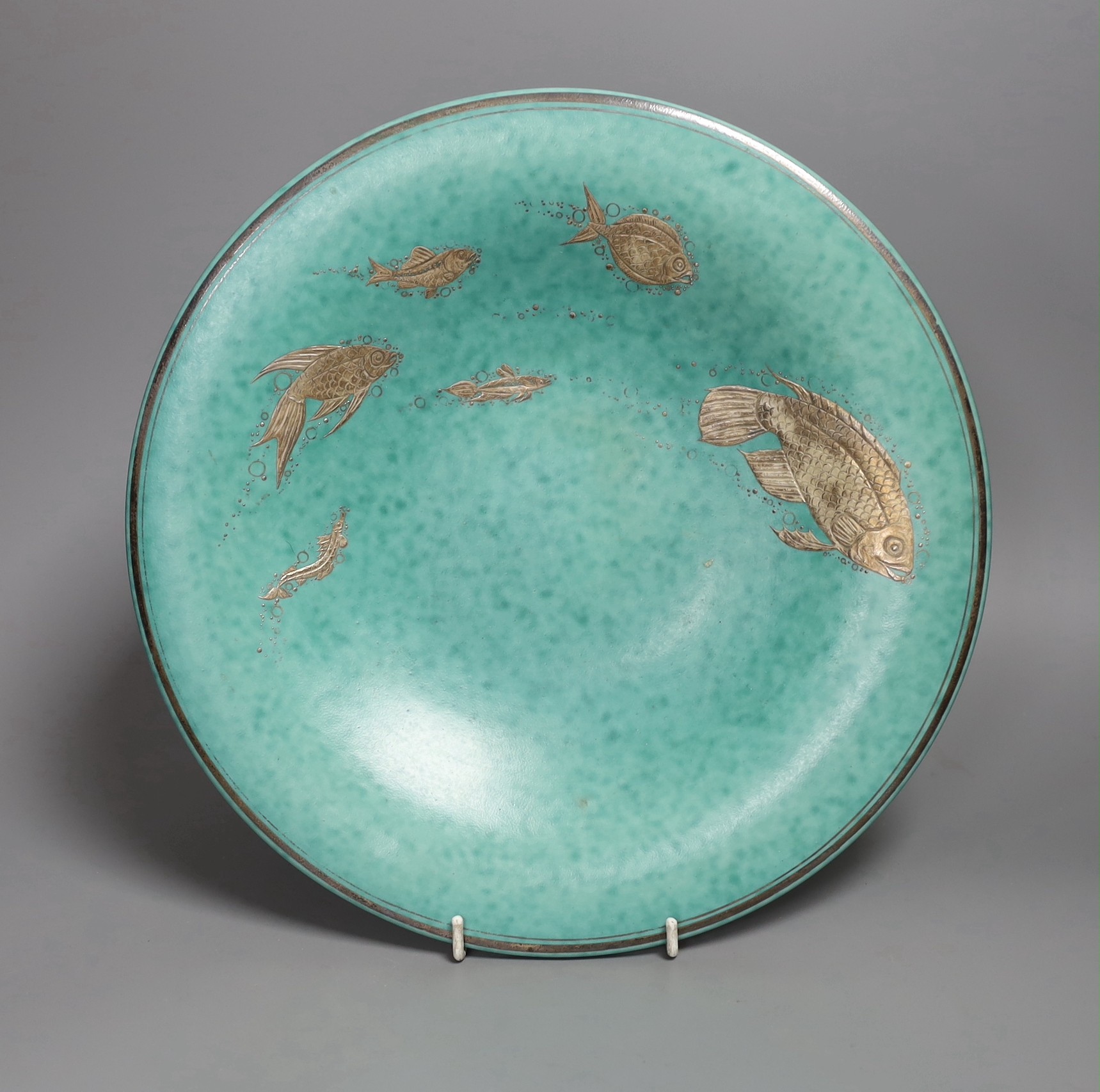 A Gustavsberg Wilhelm Kåge design Argenta 1035 shape dish decorated with fishes, 30cm diameter